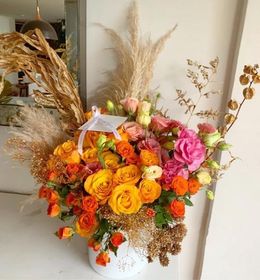 Mix naranja con follajes secos